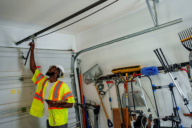 Professional Garage Door Panel Replacement technician working in Wilton, IA